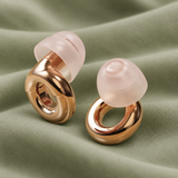 GlenNest earplugs on soft sage fabric